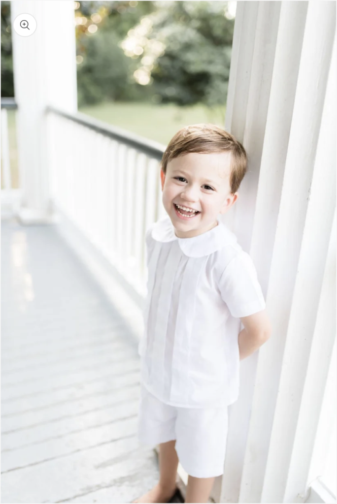 Southern Siblings offers a classic shorts set in white, perfect for heirloom portraits.